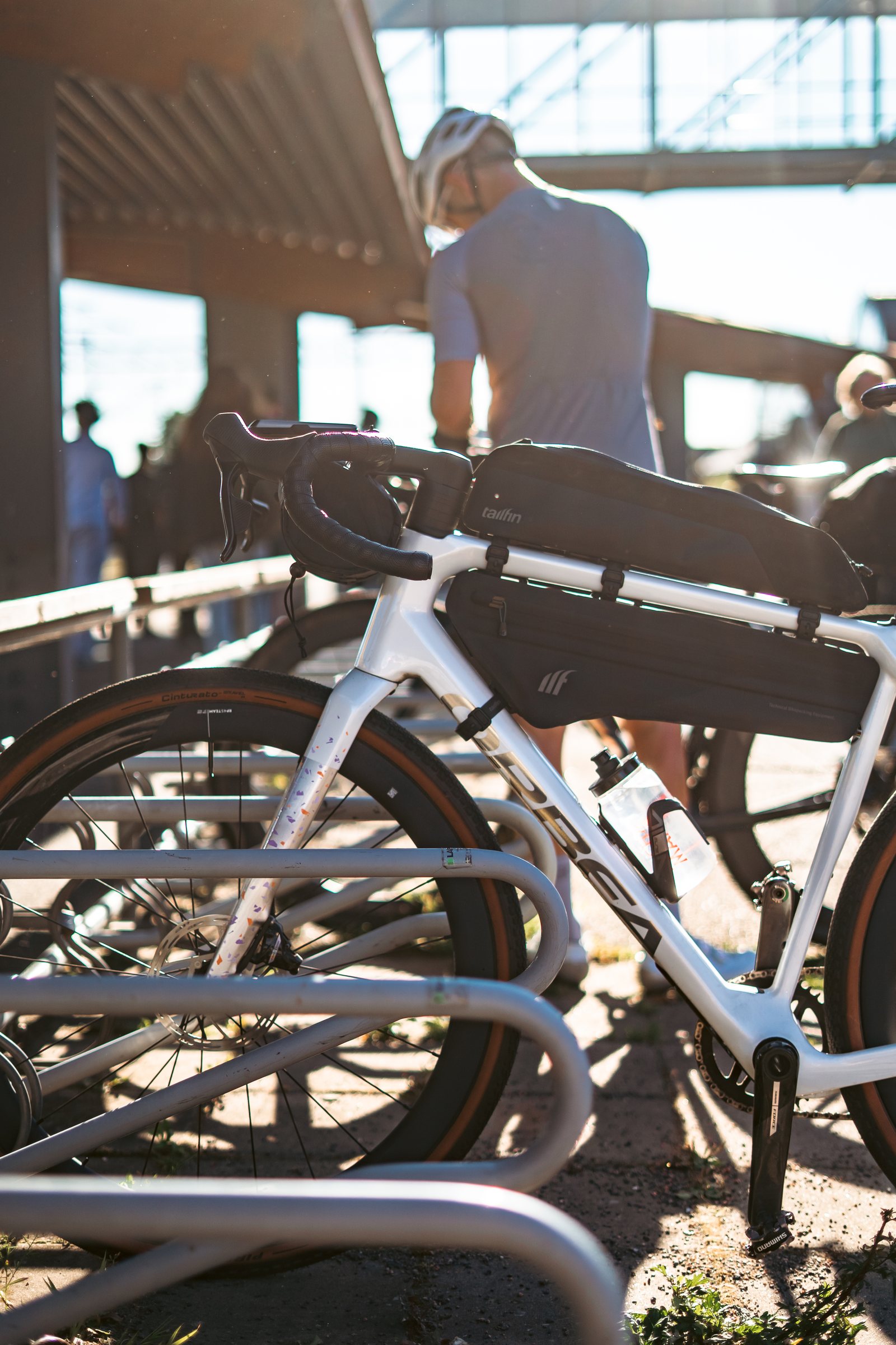 Two gravel bikes with bikepacking bags in a bike rack at Jönköping station