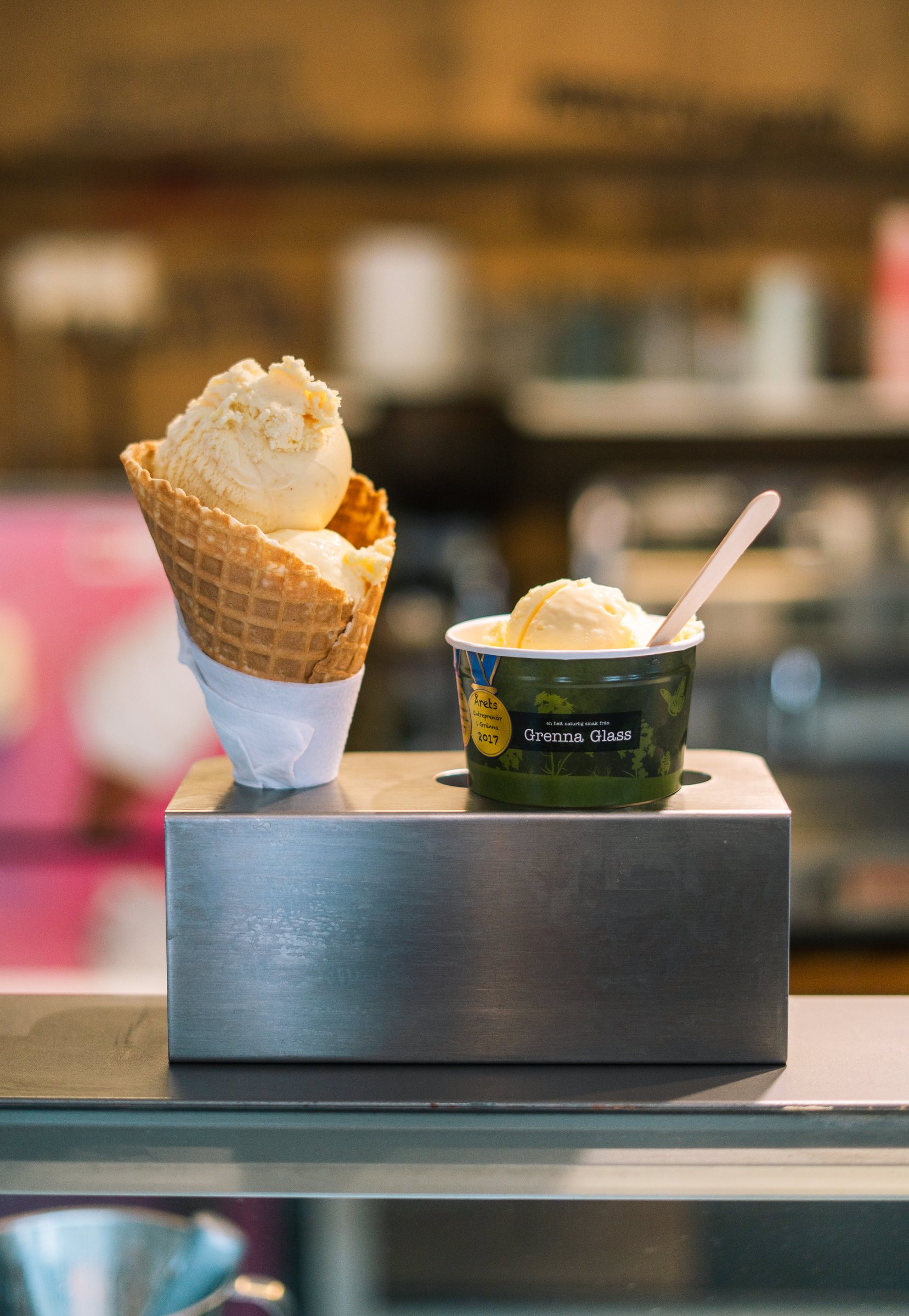Ice cream cone and cup on a counter in Gränna