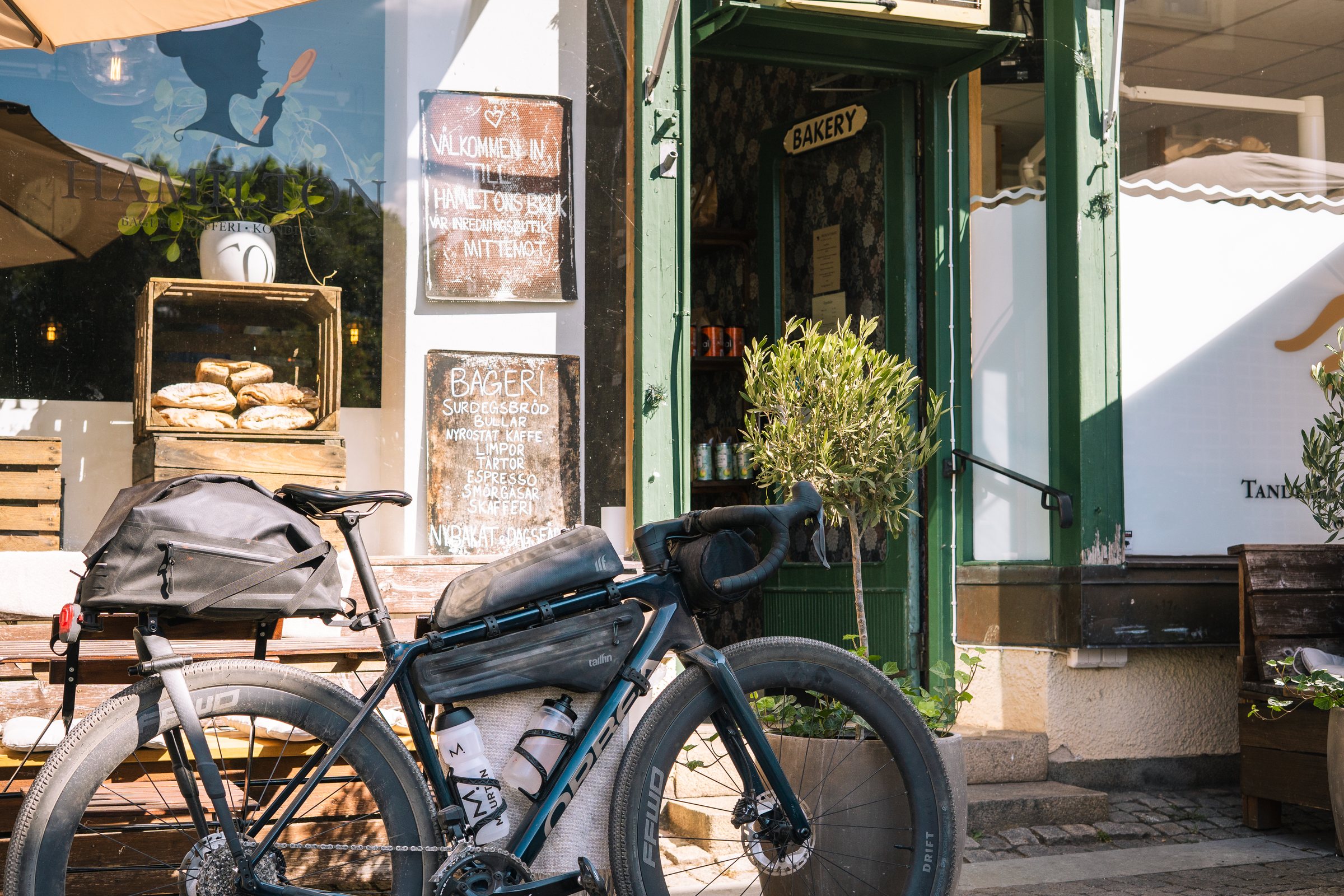 Loaded gravel bikes outside Bageri Hamilton in Vadstena